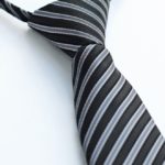 Детский галстук черный с диагональными серебряными полосами